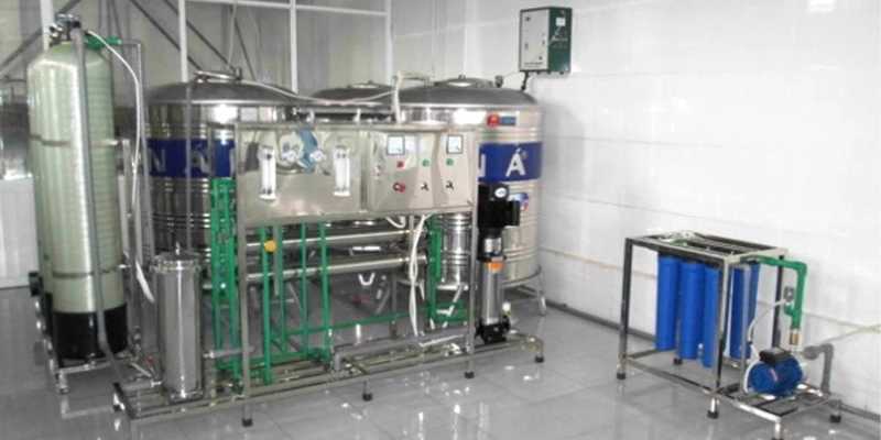 avt Dây chuyền lọc nước đóng bình hoa phượng đỏ